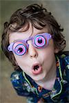 Boy wearing novelty glasses