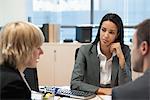 Businesswoman meeting with business partners in office