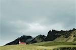 Church on mountain background Vik, Iceland