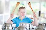 Boy pretending to be drummer