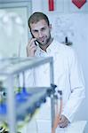 Oenologist on cellular phone