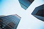 View of three skyscrapers from below