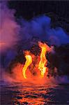 Lava flow impacting sea at dusk, Kilauea volcano, Hawaii