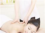 Woman having back massage