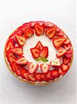 Frosted Cake Topped with Fresh Sliced Strawberries