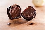 A home-made dark chocolate truffle, cut in half