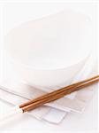 Table setting with bowl and chopsticks on a napkin (Asia)