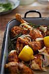 Chicken legs with garlic, lemon and herbs