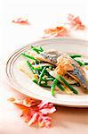 Sea bass with green beans and tomato sauce