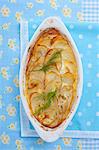 Potato gratin with fennel leaves