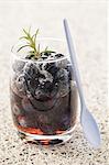 Blueberries in red wine with rosemary