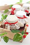 Jars of Homemade Cherry Jam in a Box