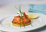 Blini with smoked salmon, sour cream and chives