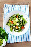 Bean salad with broad beans, peas, carrots, feta and limes