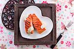 Grilled salmon steaks with dill sauce
