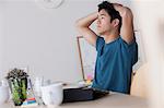 Male office worker sitting at desk