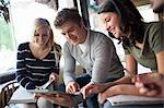 Group of people studying together in cafe