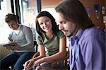 Group of people studying together in coffee shop