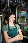 Portrait of teenage girl through cafe window