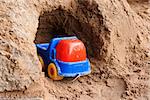 toy truck in the garage out of the sand