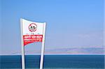 Dead Sea, West Bank Israel swimming prohibited sign.
