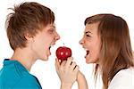 boy and a girl biting the apple on a white background