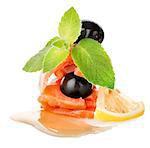 Salmon with lemons and olives isolated on a white background