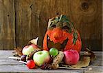 Halloween pumpkin Jack O'Lantern on a wooden background