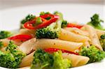 classic Italian penne pasta with broccoli and red chili pepper