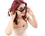 Attractive women wearing a dress and  sun glasses trying to hear something