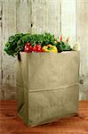 Bagged Grocery Produce Items on a Wooden Plank