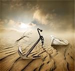 Boat, anchor and dry tree in the desert
