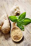 Ginger and basil on wooden table