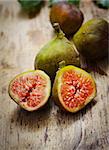 Sliced fig on rustic wooden table