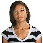 Serious teenage female in stripes over white background