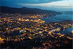 This is a top view of Bergen (the west coast of Norway) in night. The town is illuminated.
