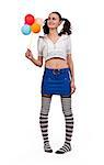 girl in striped socks, mini skirt with a toy and balloons