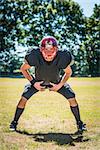 picture of concentrated american football player in position