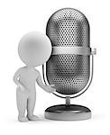 3d small person standing next to a vintage microphone. 3d image. Isolated white background.