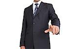 Classy businessman pointing finger on white background