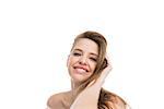 Bare natural woman smiling at camera  on white background