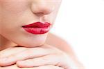 Close up on gorgeous models red lips on white background