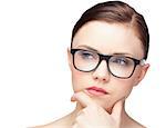 Thinking natural model wearing classy glasses on white background