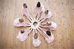 Elevated view of young ballerina group in circle