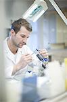 Dental technician making denture