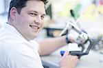 Portrait of dental technician working in lab