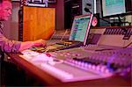 Music producer recording in studio