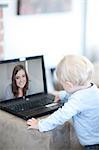 Baby boy distracted on video call to mother