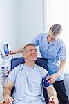 Nurse taking patient's blood pressure