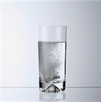 Glass of carbonated beverage
